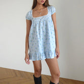 Women's charming square neck printed mini dress.